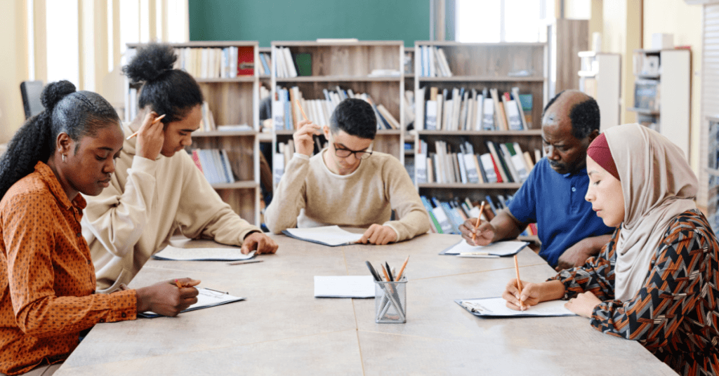 students sitting around table